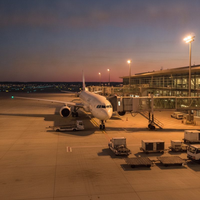 airliner boarding at dusk